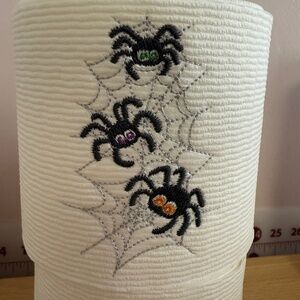 Unique holiday embroidered toilet paper, black spiders stack for Halloween
